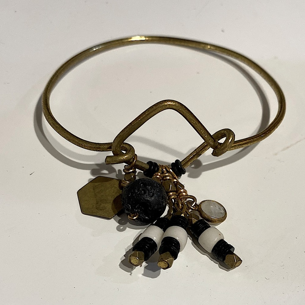 Sseko Designs brass charm bracelet.